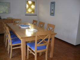 dining room with a huge table and 8 chairs
